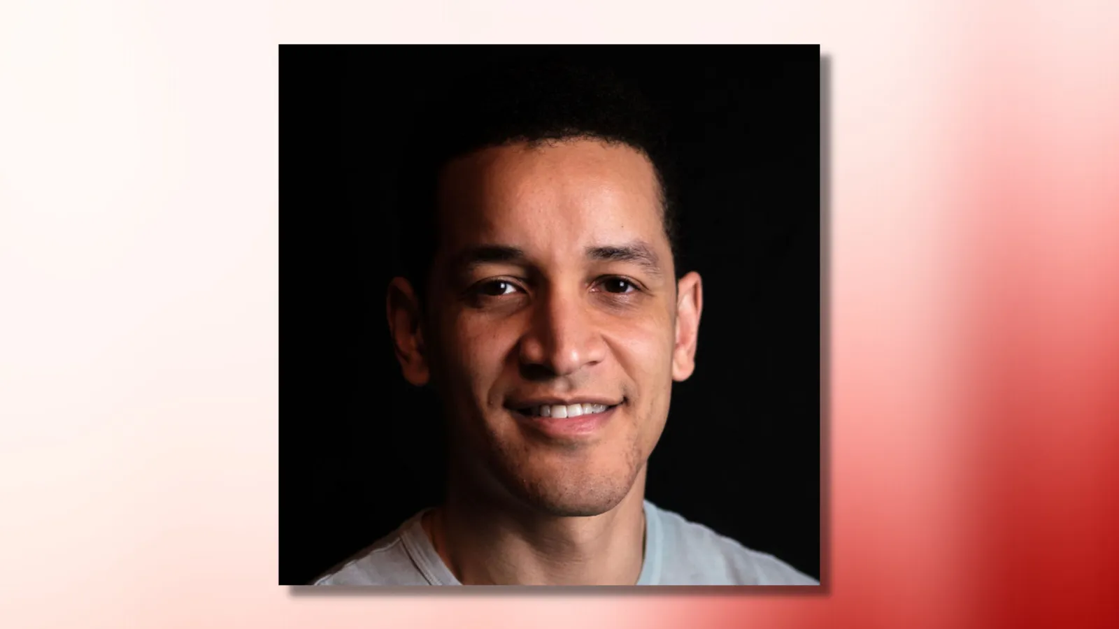 chris tibbs headshot on red and white ombre background