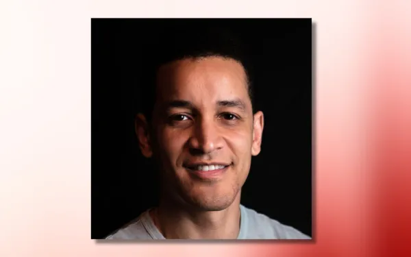 chris tibbs headshot on red and white ombre background