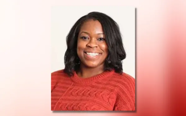 erinn brooks headshot on red and white ombre background
